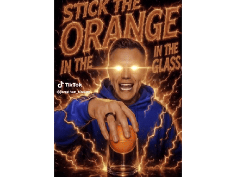 STICK THE ORANGE IN THE GLASS