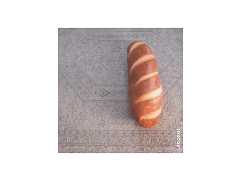 Dog rolling into bread 