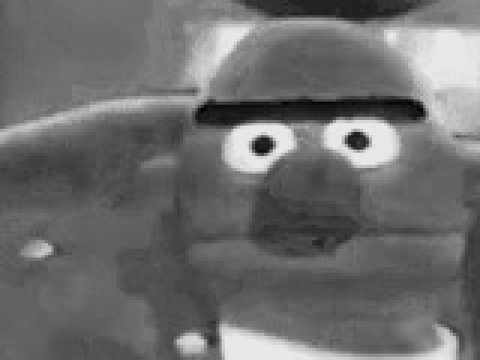 Bert stares blankly (and blackly)